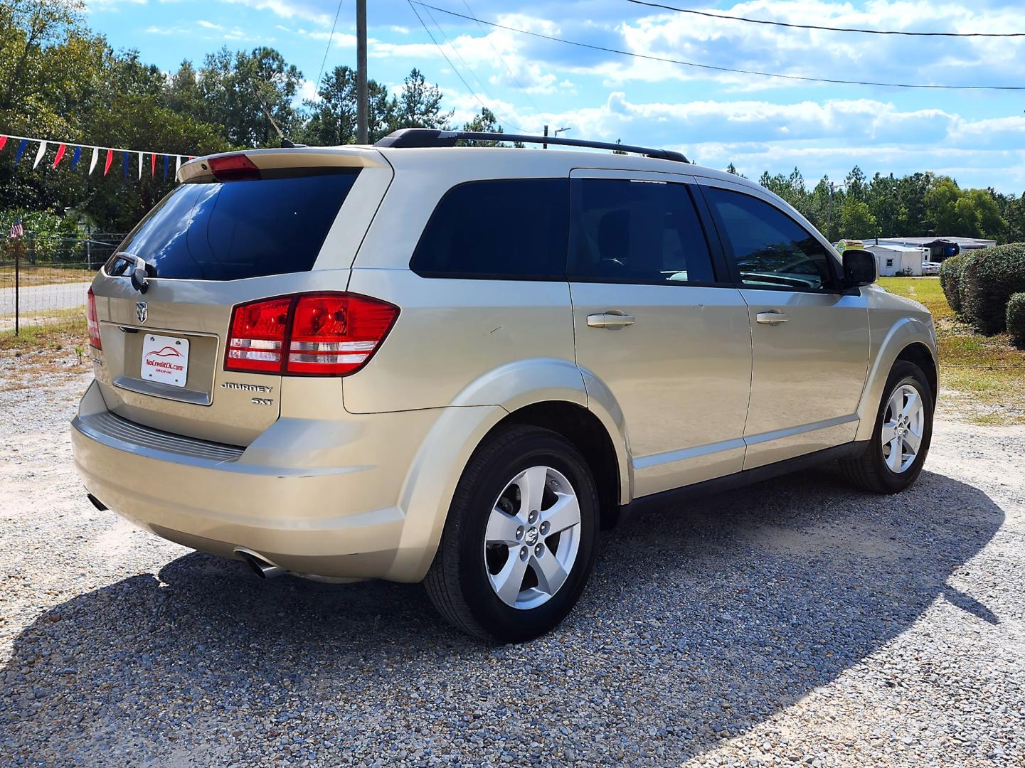 2010 Biege Dodge Journey SXT (3D4PG5FV1AT) with an 3.5L V6 SOHC 24V engine, 6-Speed Automatic transmission, located at 18001 Kellogg Rd, Saucier, MS, 39574, (228) 832-1441, 39.421459, -76.641457 - THIRD ROW !! 2010 DODGE JOURNEY SXT – It's A CARFAX Well-Maintained Vehicle! – CARFAX GREAT-VALUE Vehicle! – DODGE Strong! - V6! 3.5L SOHC 24V – Runs GREAT - Just Serviced! – AUTOMATIC Transmission – Ice COLD A/C with Rear Controls – AM // FM // - Photo#4